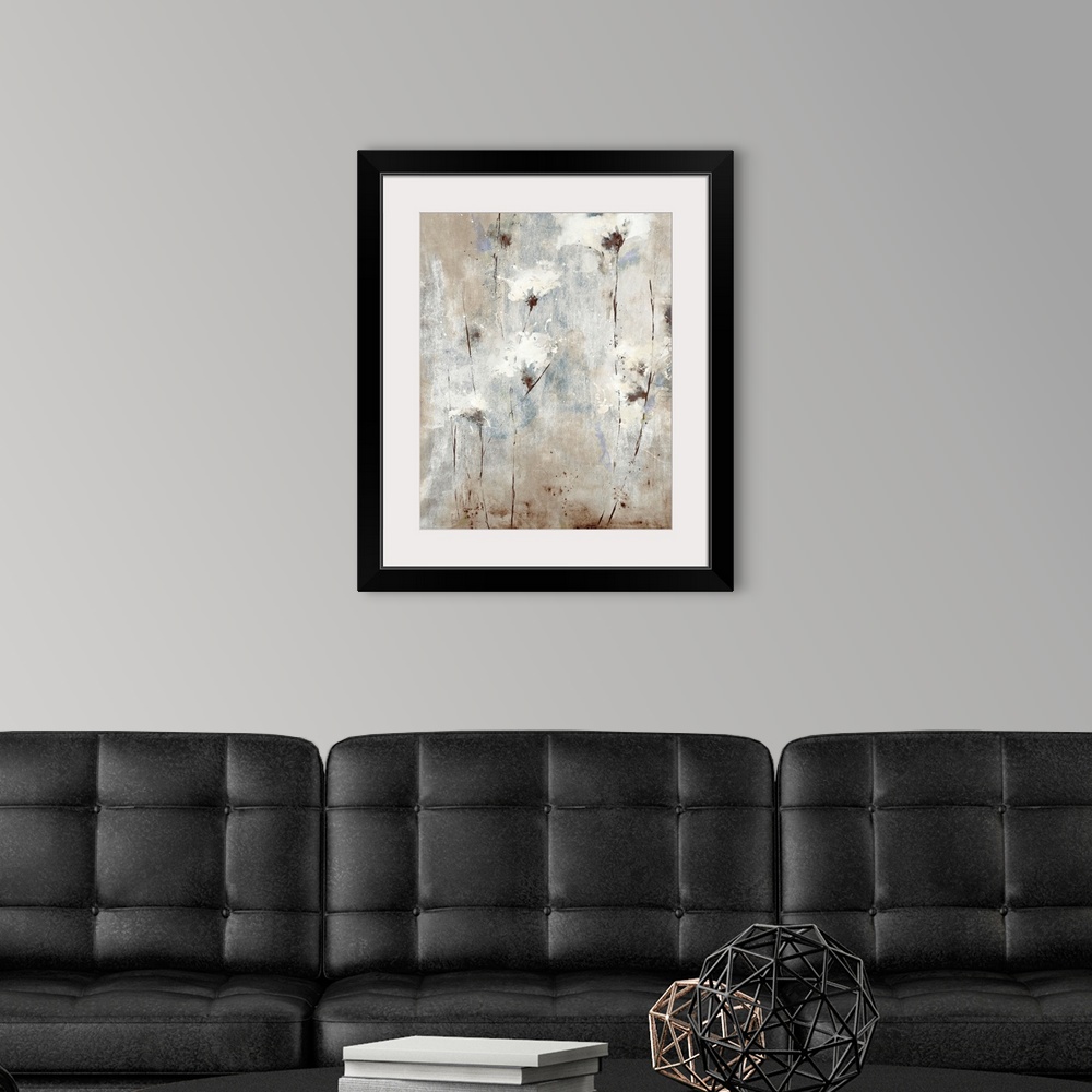 A modern room featuring A soft, contemporary painting of whispy white flowers on a neutral background with blue tones
