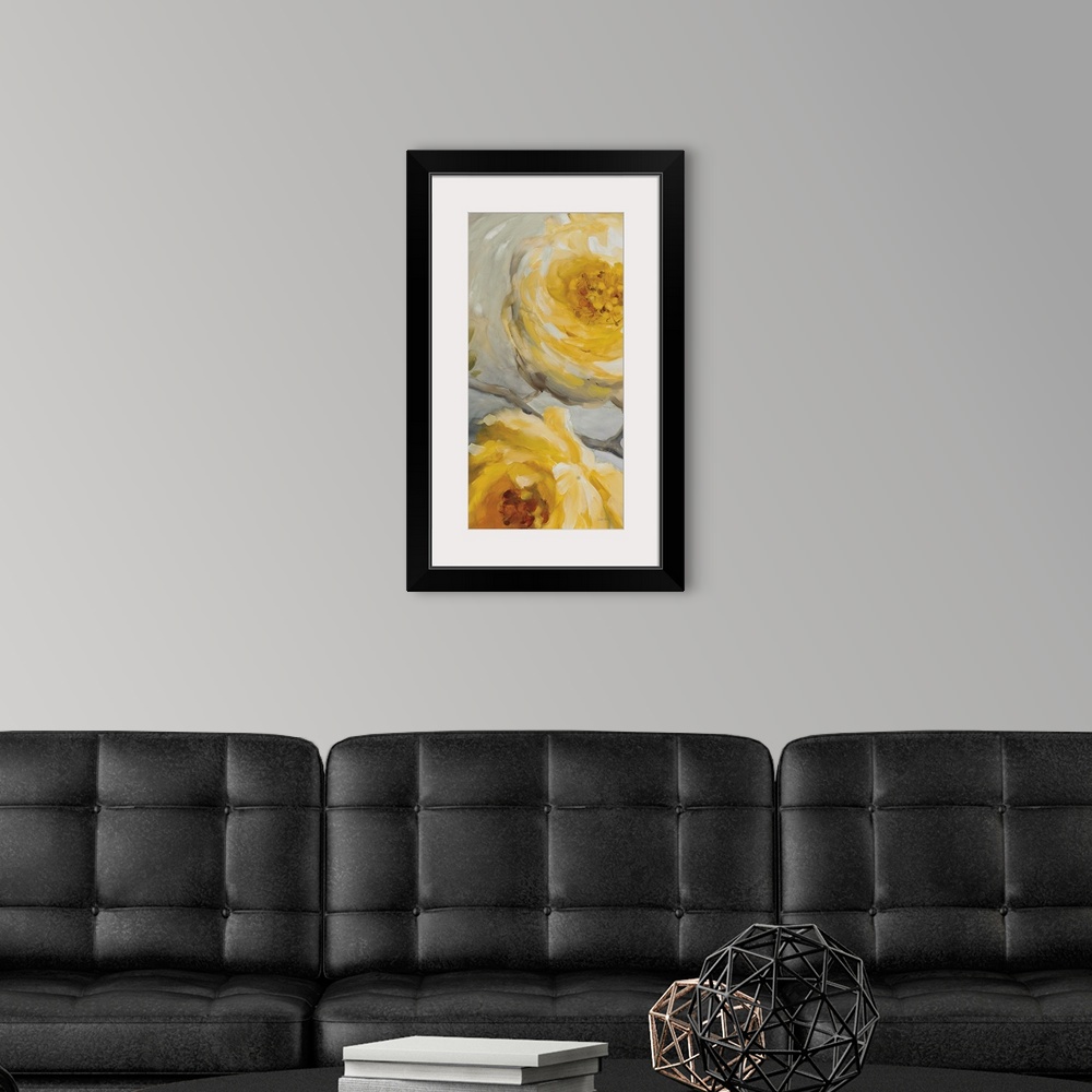 A modern room featuring Vertical contemporary painting of large yellow flowers against a gray backdrop.