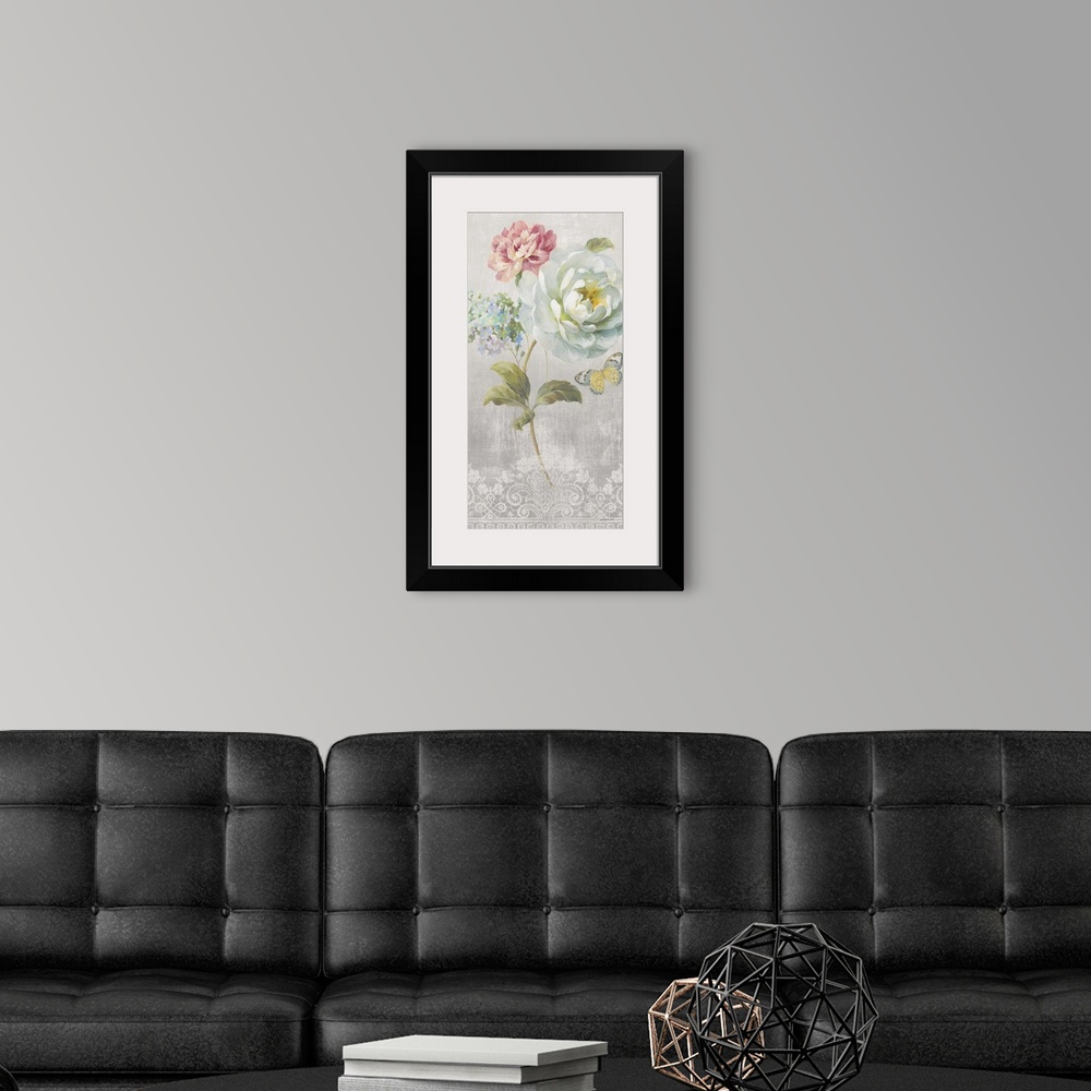 A modern room featuring Contemporary artwork of soft flowers against a gray and ornately patterned background.