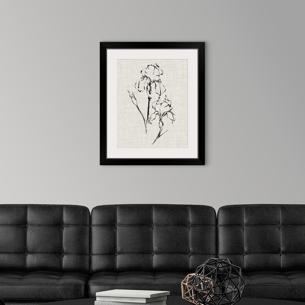 A modern room featuring A black ink drawing of a flower against of beige linen background.