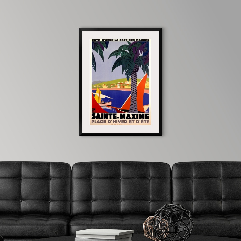 A modern room featuring Vertical, large vintage advertisement for Sainte-Maxime, France.  Palm trees over a body of water...