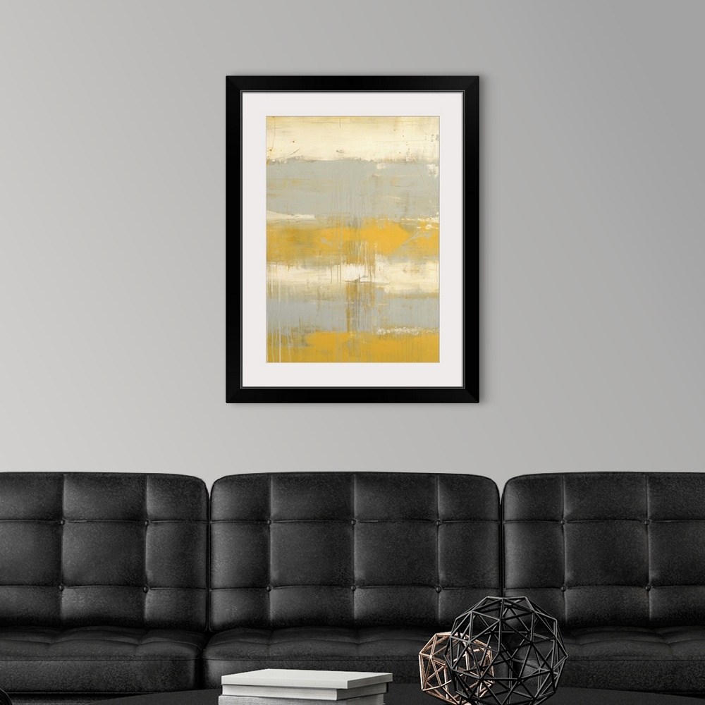 A modern room featuring Contemporary painting of a color-field of pale yellow and light gray.