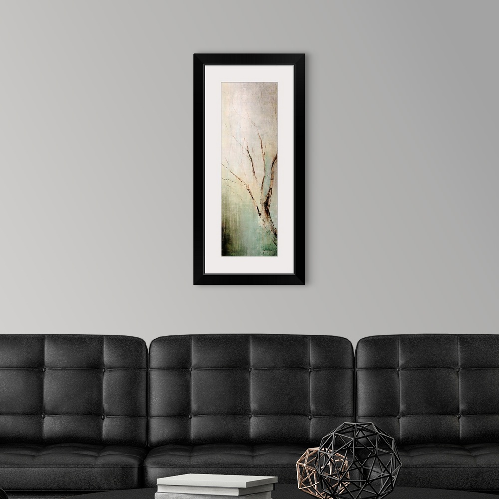 A modern room featuring Panoramic contemporary art depicts a lone tree branch composed of earth tones as it sits in front...