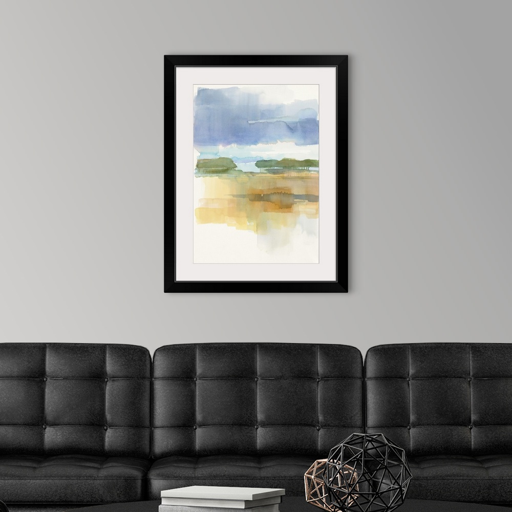 A modern room featuring Watercolor painting of a simple landscape in soft blue twilight.
