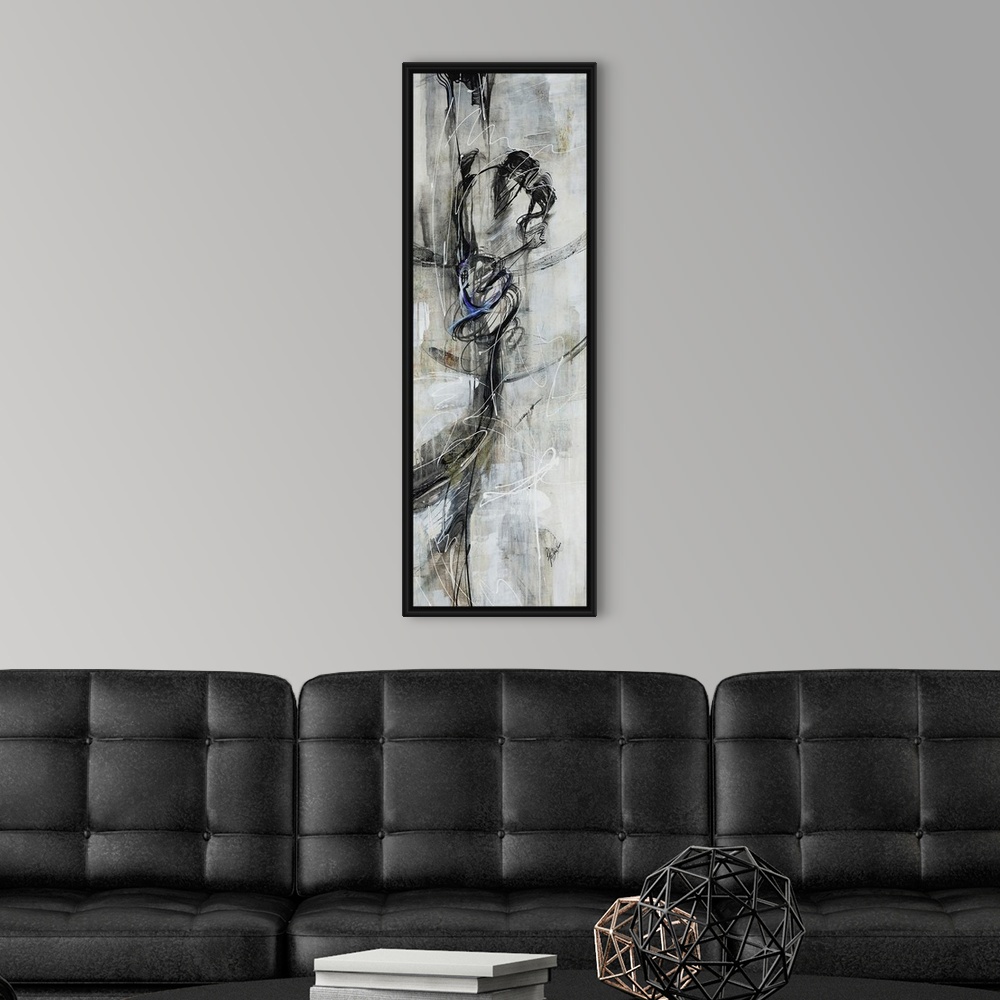 A modern room featuring Figurative art work of a female dancer in various shades of black and gray.
