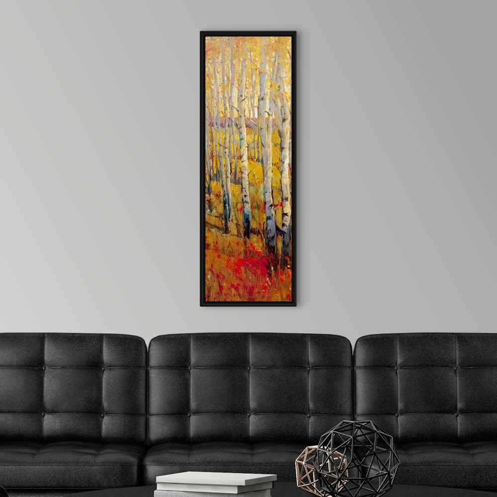 A modern room featuring This vertical painting of white barked trees in a narrow landscape of autumn colored grass.