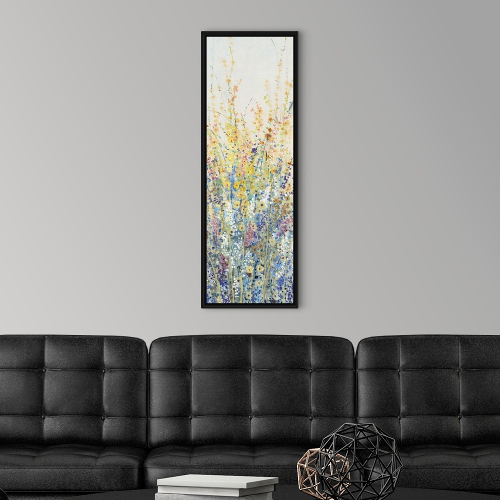 A modern room featuring Vertical panel of blooming yellow and blue wildflowers in a field.