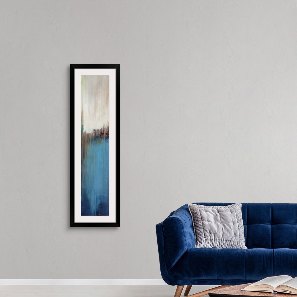 A modern room featuring Abstract painting with a composition of varying shades of blue, cool gray, and tan divided in thr...