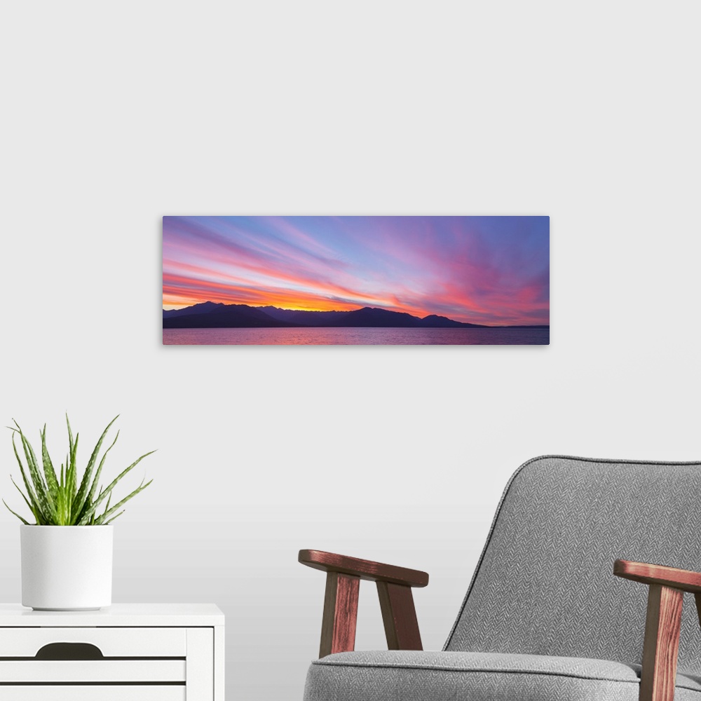 A modern room featuring USA, Washington, Seabeck. Sunset panoramic over the Olympic Mountains and Hood Canal.