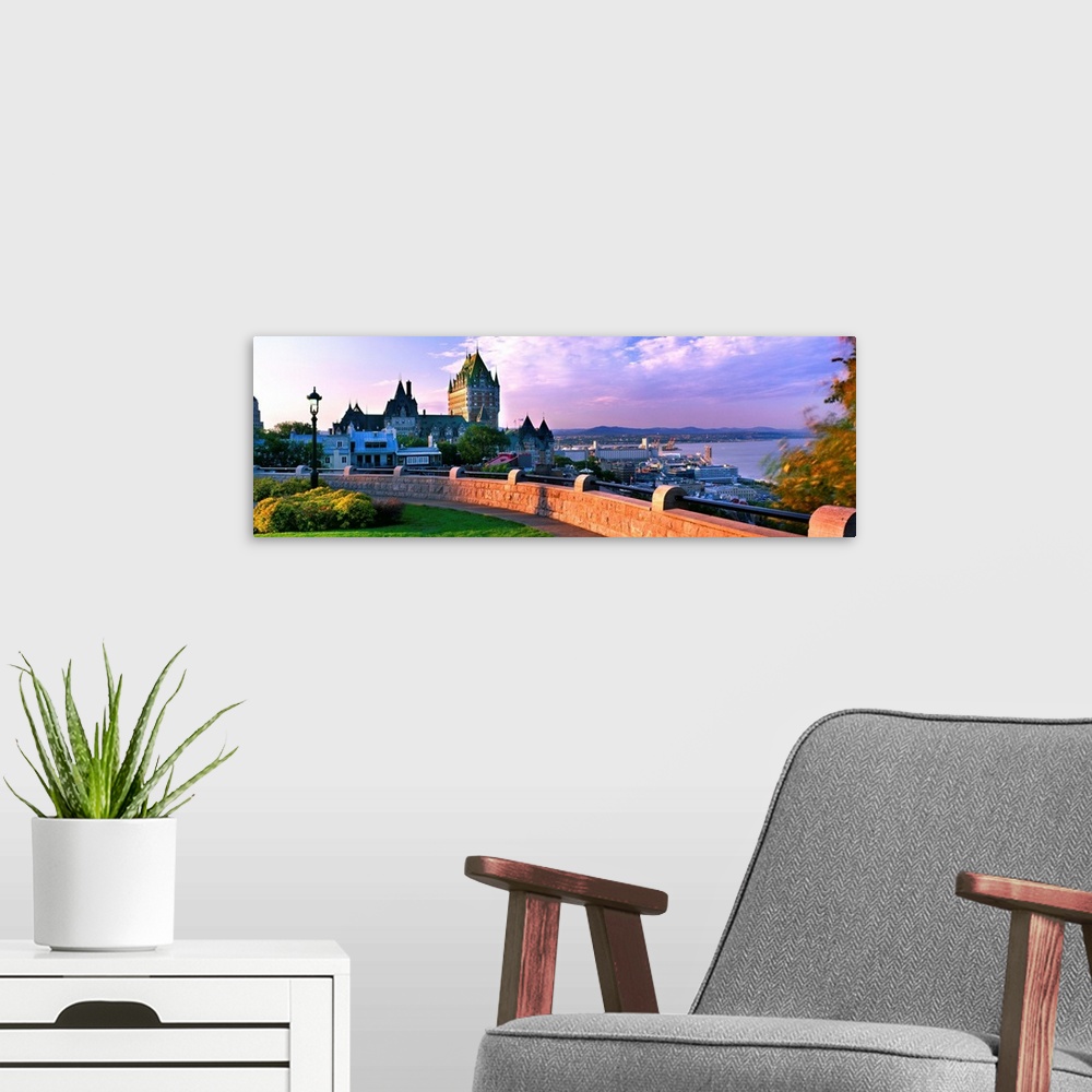A modern room featuring Canada, Quebec, Quebec city, Chateau Frontenac and St Lawrence River at sunset