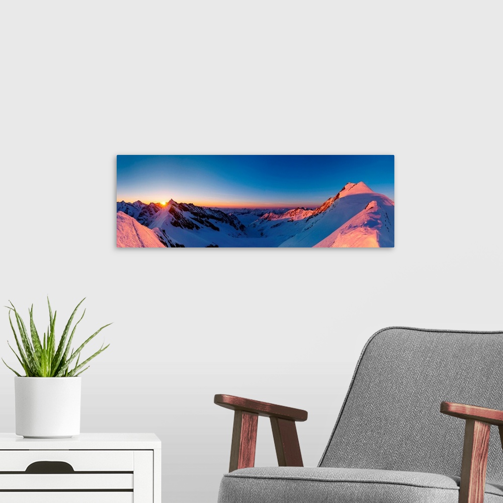 A modern room featuring Panoramic view of Aletschorn at sunrise with red light. Aletschorn, Vallese.