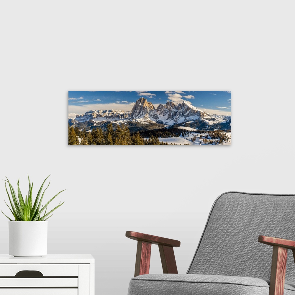 A modern room featuring Scenic winter view over Seiser Alm, Alpe di Siusi dominated by Sella group on the left and Sassol...
