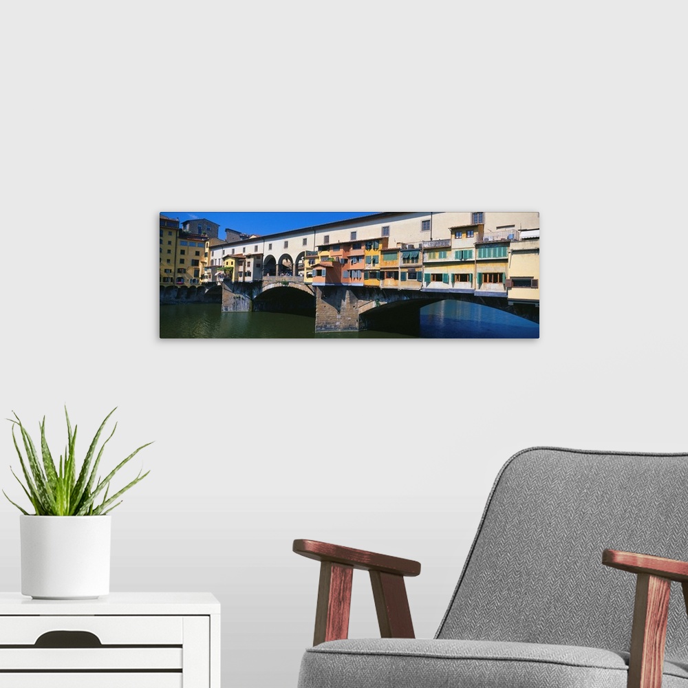 A modern room featuring Bridge across a river, Ponte Vecchio, River Arno, Florence, Tuscany, Italy