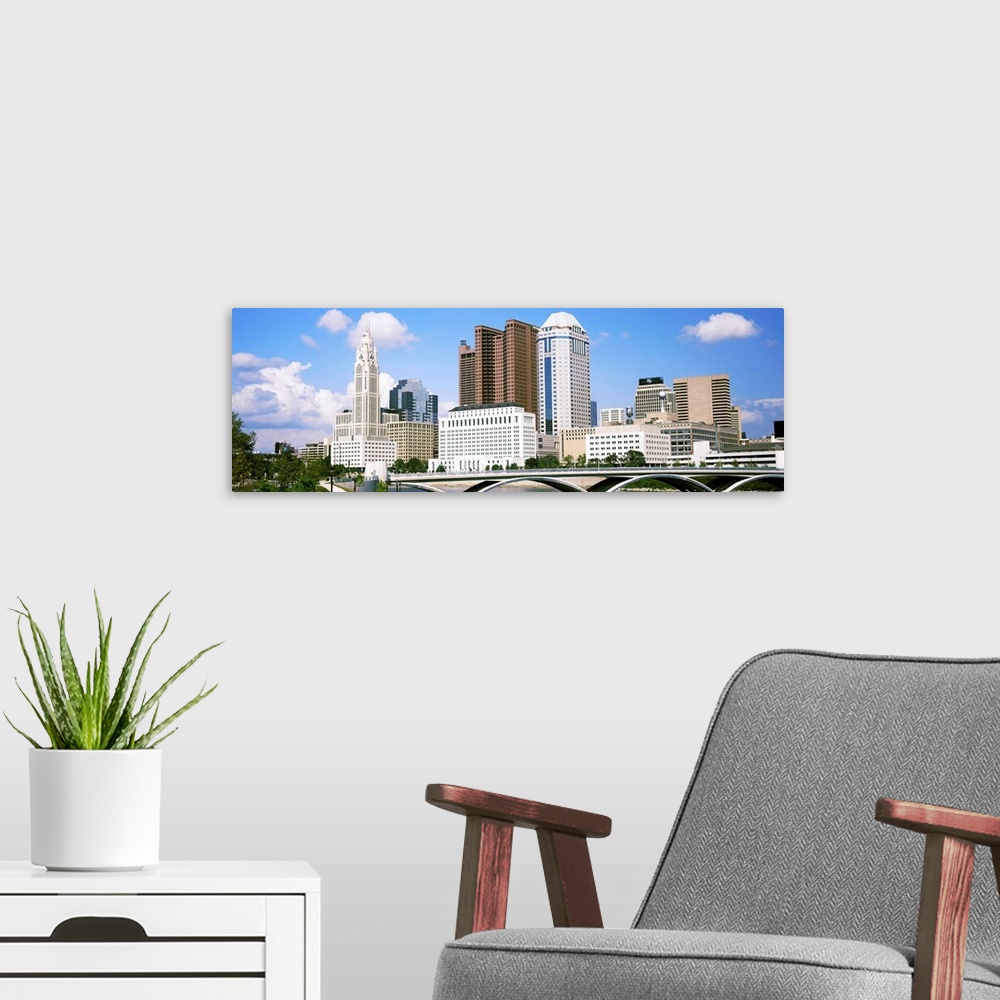 A modern room featuring Bridge across the Scioto River with skyscrapers in the background, Columbus, Ohio, USA
