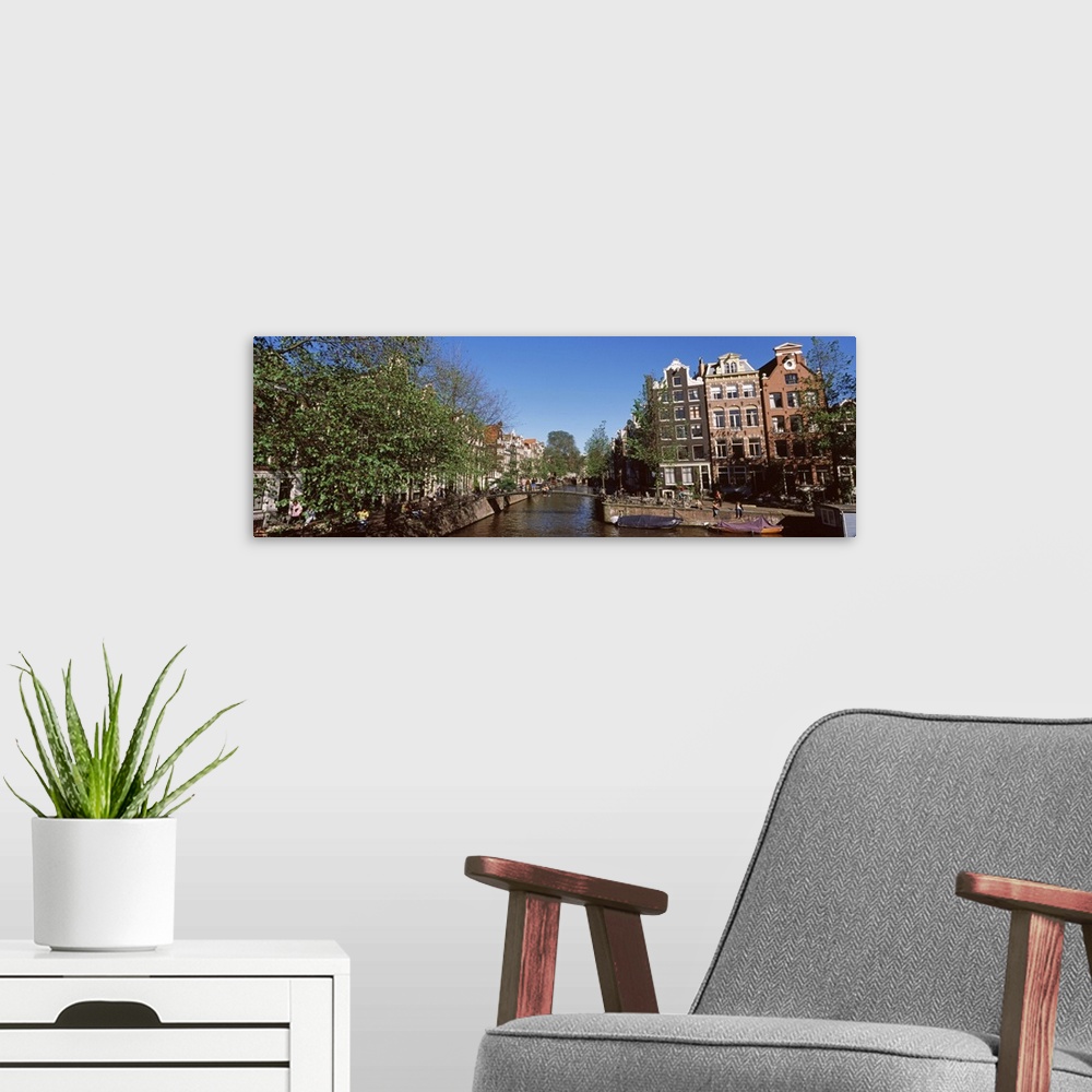 A modern room featuring Buildings in a city, Amsterdam, North Holland, Netherlands