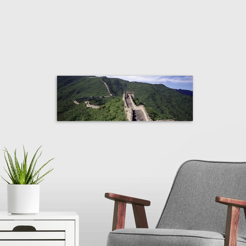 A modern room featuring Panoramic view of the Great Wall of China which spans over 4,000 miles, making it the longest man...