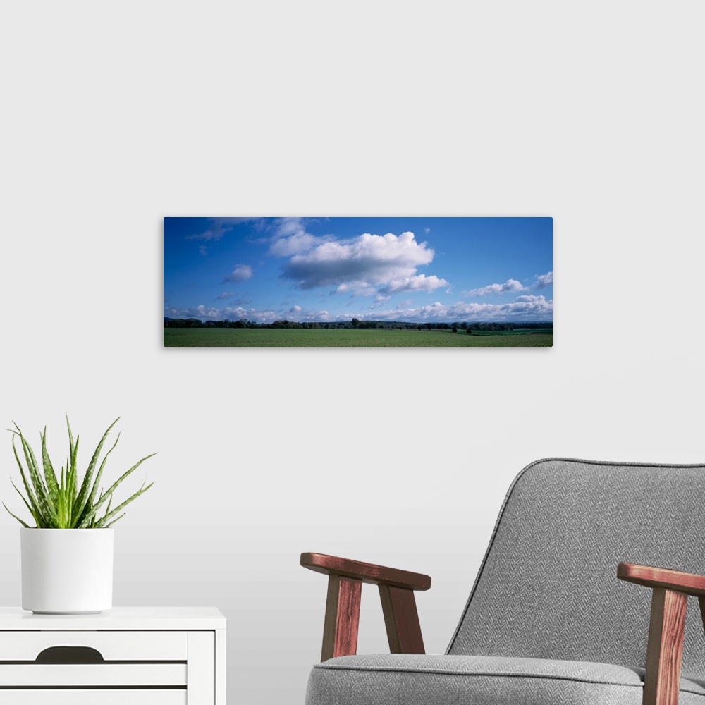 A modern room featuring Clouds over a field, Upstate New York, New York State, USA