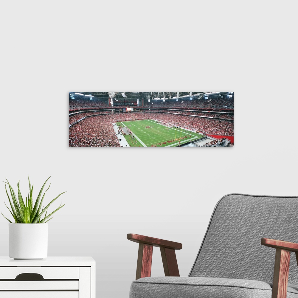 A modern room featuring High angle view of spectators in a football stadium, University of Phoenix Stadium, Glendale, Pho...