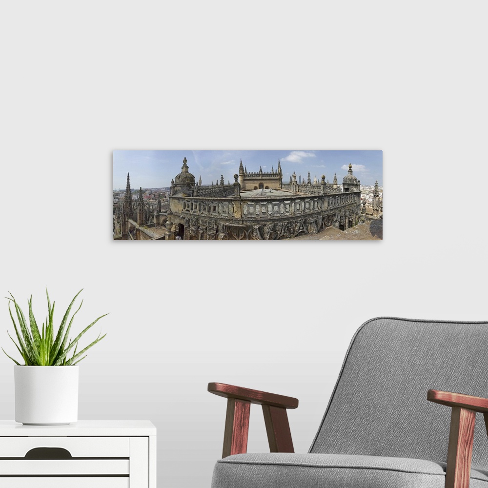 A modern room featuring High angle view of the Seville Cathedral, Seville, Andalusia, Spain