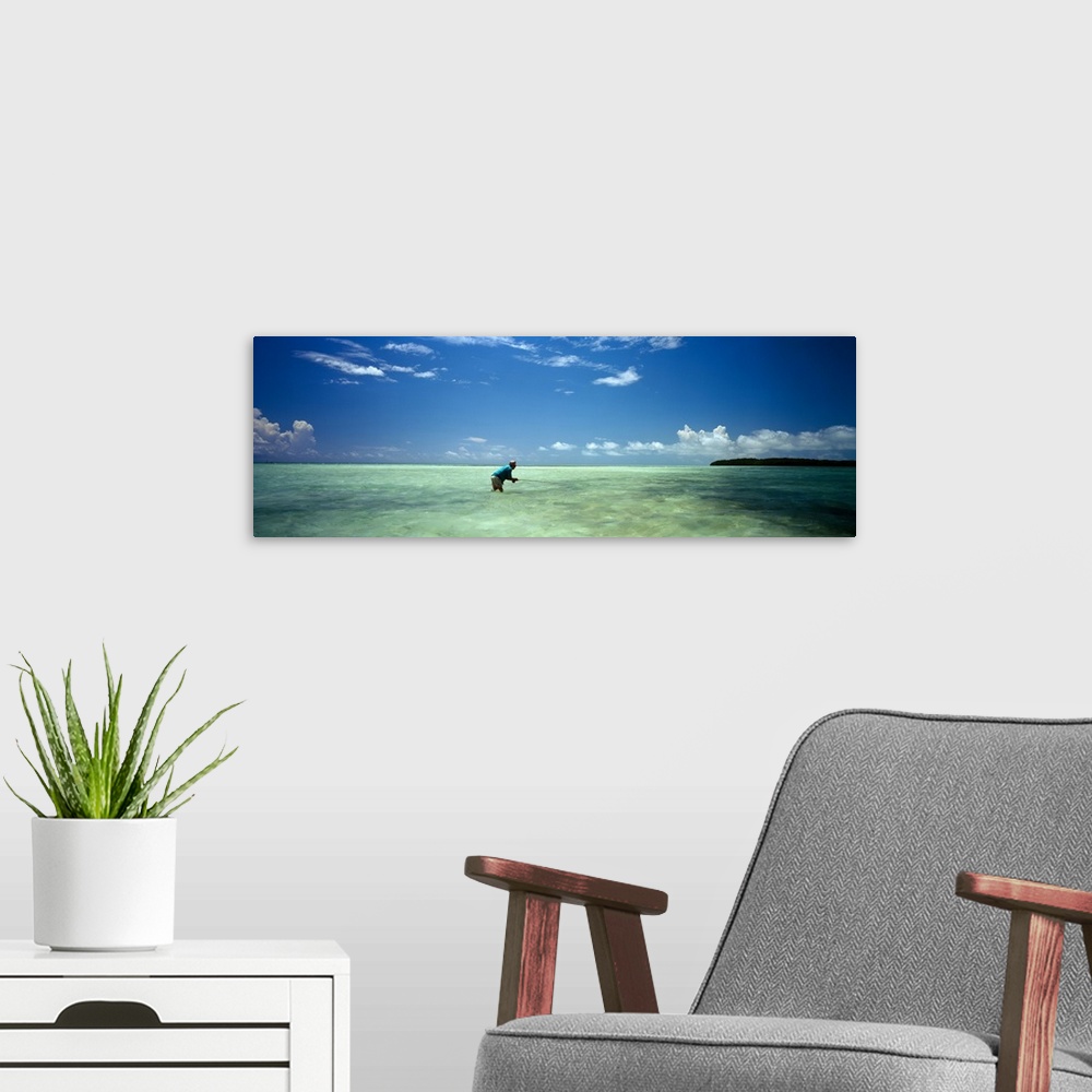 A modern room featuring Person fishing on the beach, Islamorada, Florida Keys, Monroe County, Florida, USA