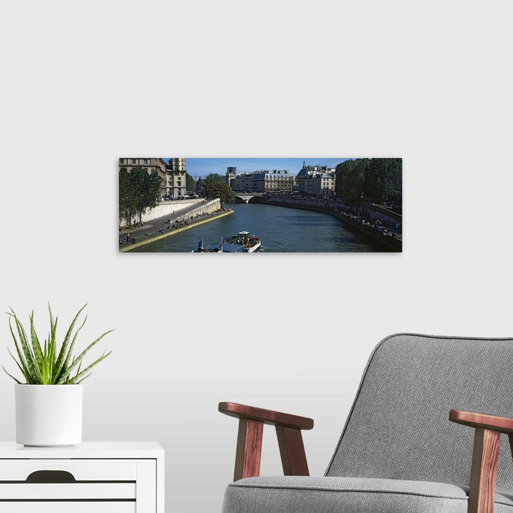 A modern room featuring River in a city, Seine River, Paris, Ile de France, France