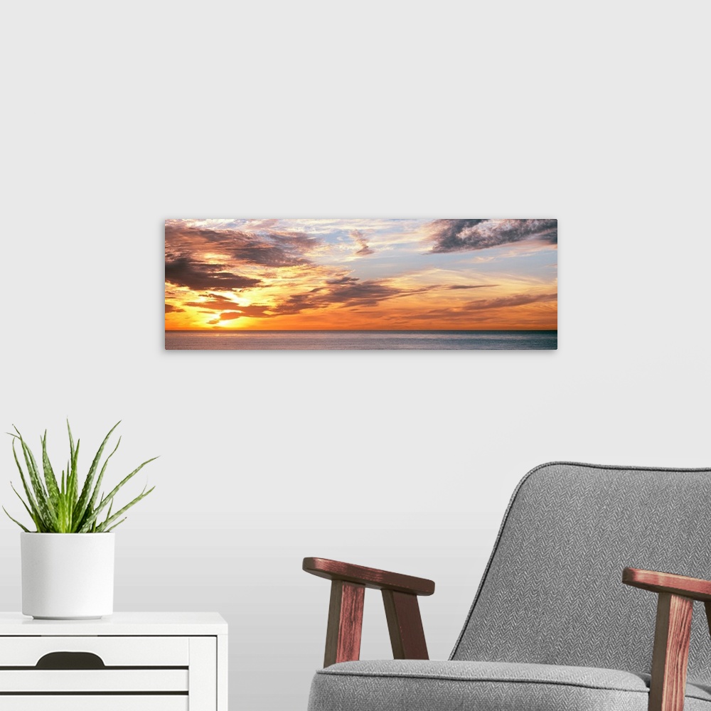 A modern room featuring Scenic view of sunset over Pacific Ocean, La Jolla, San Diego, San Diego County, California, USA.