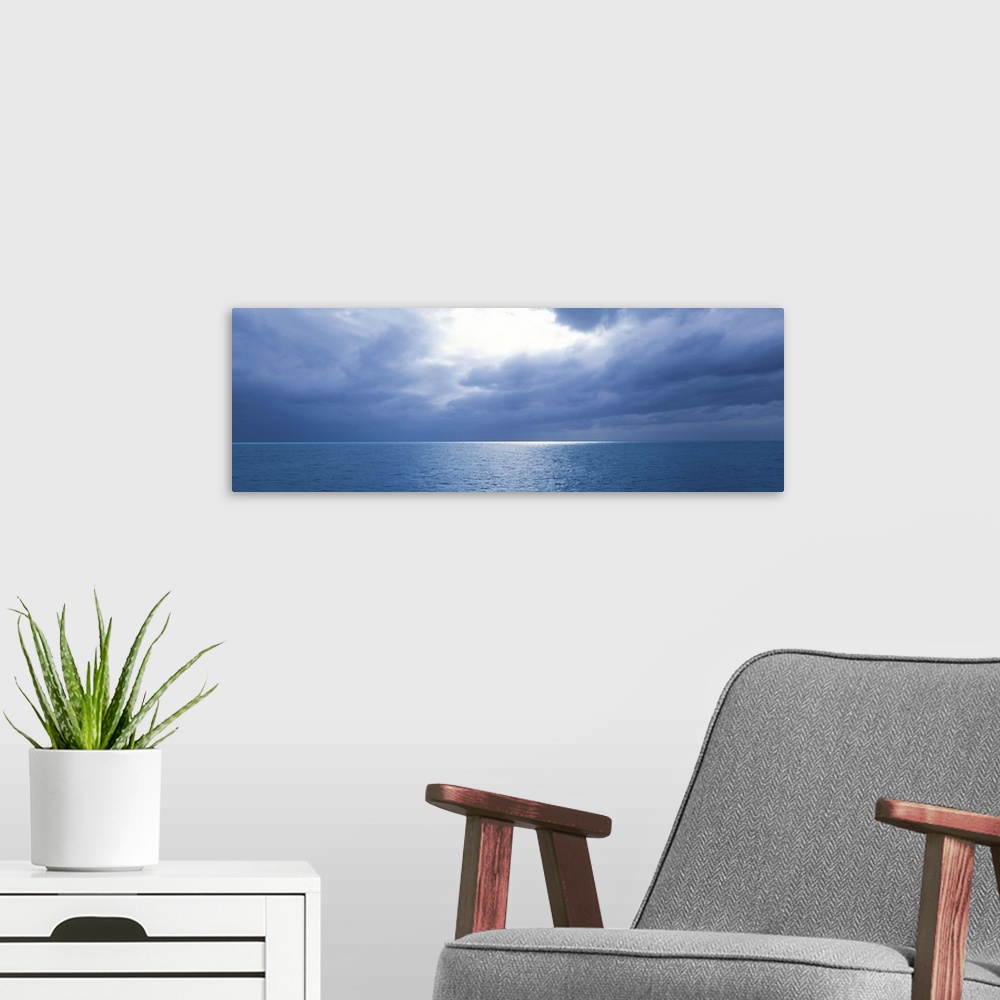 A modern room featuring Storm Clouds over the sea