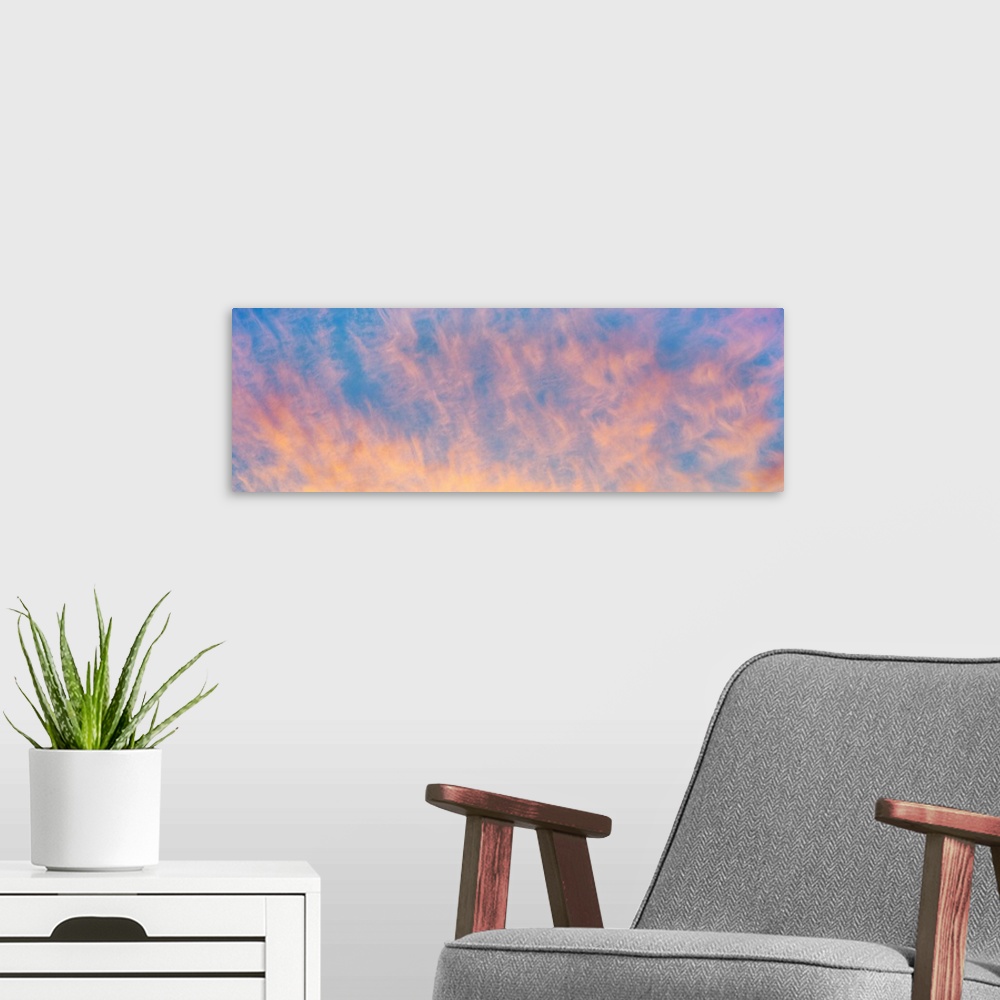 A modern room featuring Sunrise colored cirrus clouds dance across the sky at La Jolla, San Diego, San Diego County, Cali...