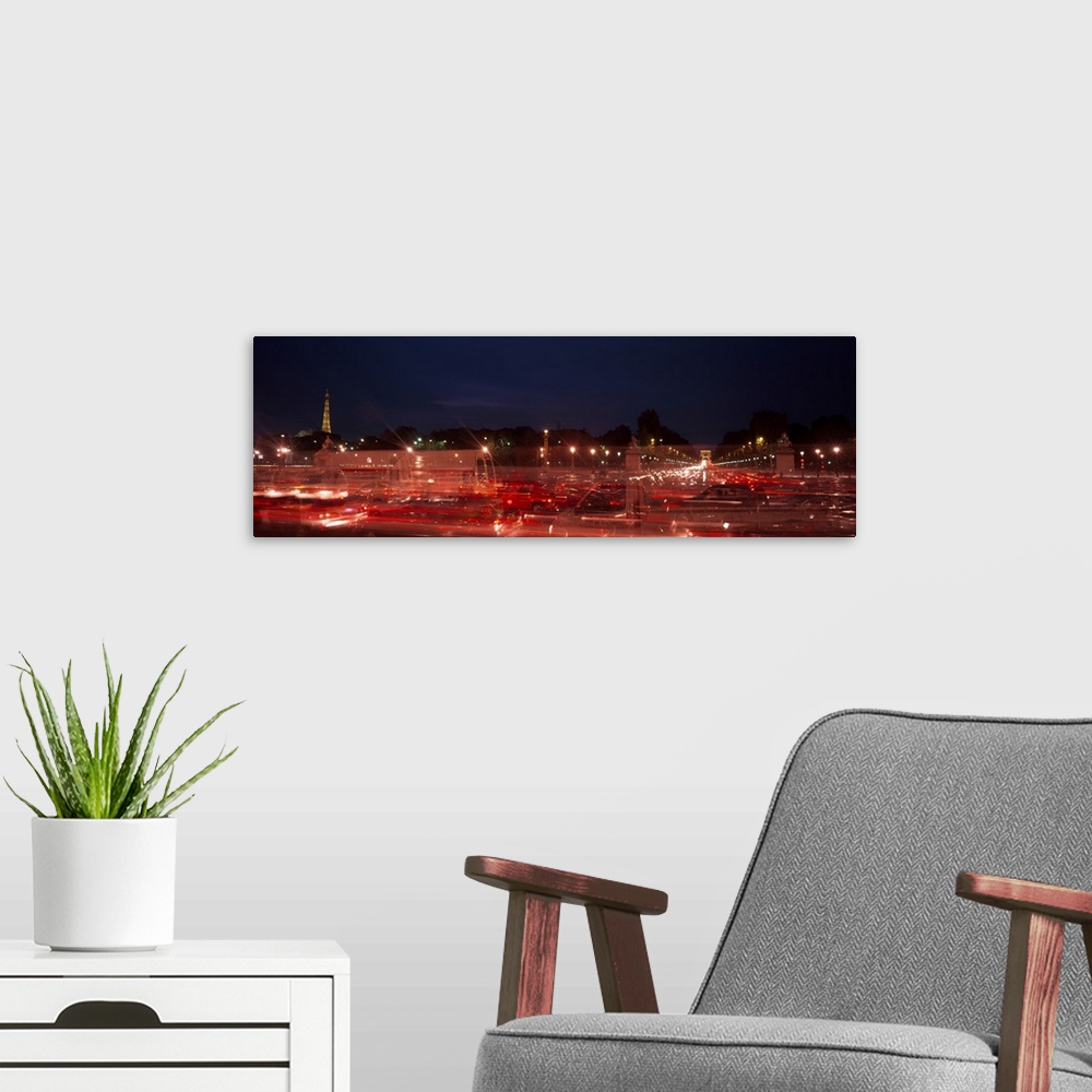 A modern room featuring Traffic on the road at night with a prison in the background, Conciergerie, Paris, Ile-de-France,...