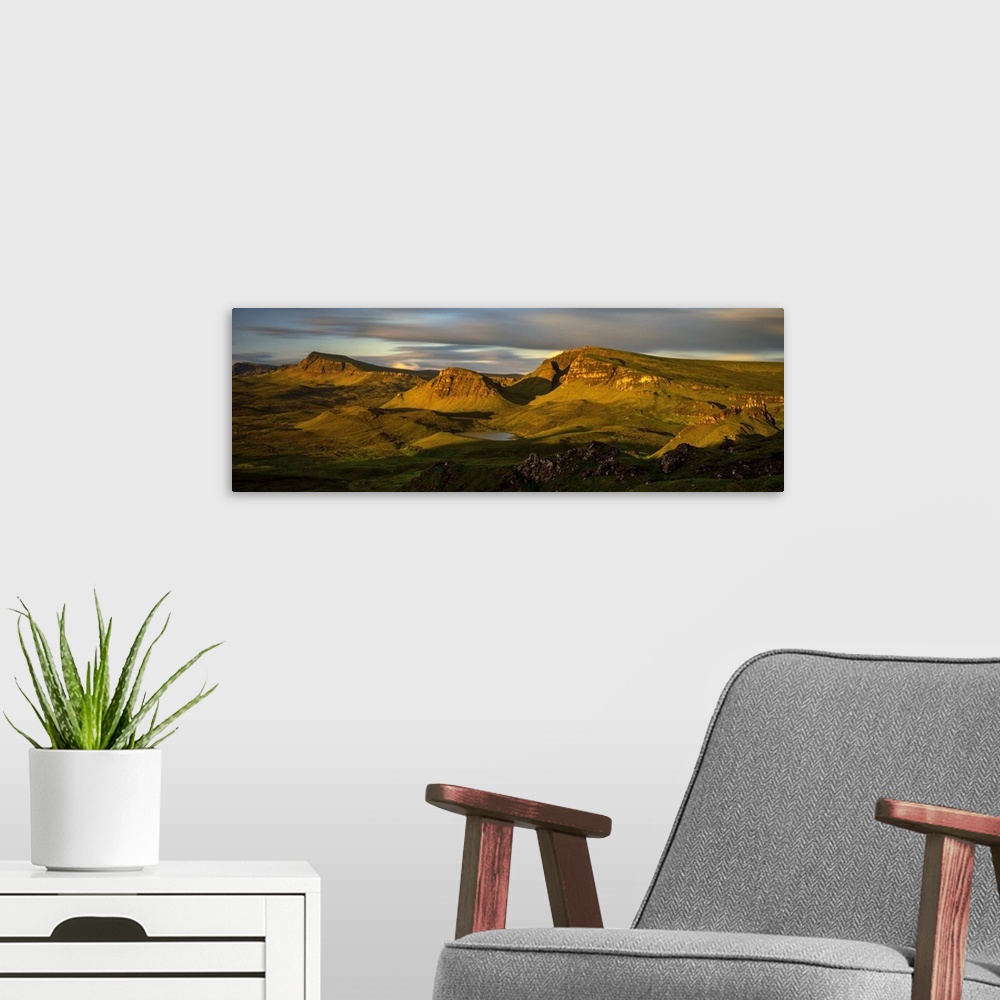 A modern room featuring Trotternish Ridge in morning light, Isle of Skye, Scotland.
