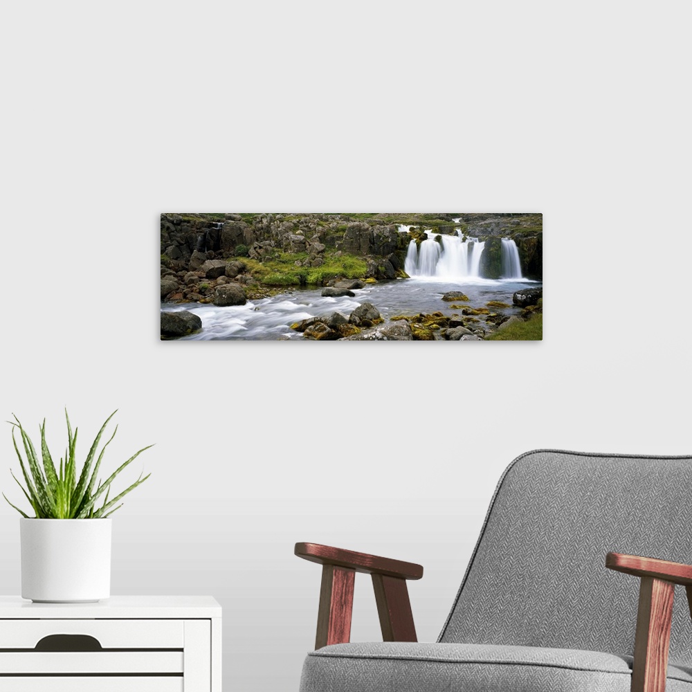 A modern room featuring Waterfall on rocky stream, Iceland