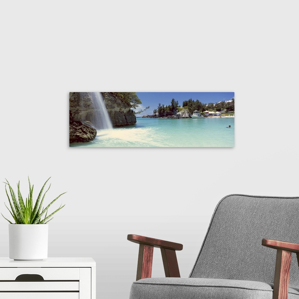 A modern room featuring Waterfall With Tourist Resorts In The Background, Bermuda