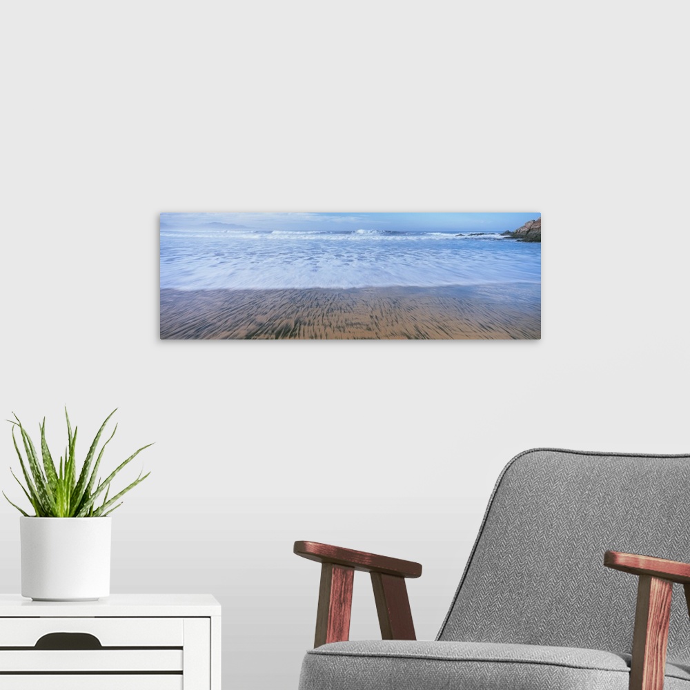 A modern room featuring Waves on the beach, Playa Los Cerritos, Cerritos, Baja California Sur, Mexico.