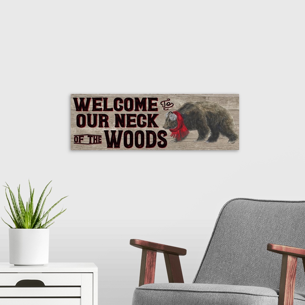 A modern room featuring Decorative image of 'Welcome To Our Neck Of The Woods' with a brown bear wearing ear muffs and a ...