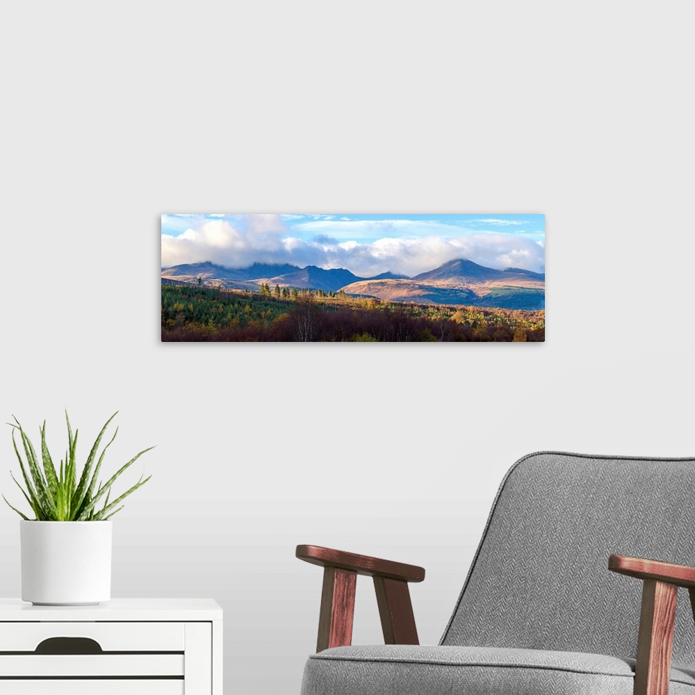 A modern room featuring View of Goatfell and the Northern Mountains, Isle of Arran, North Ayrshire, Scotland, United King...
