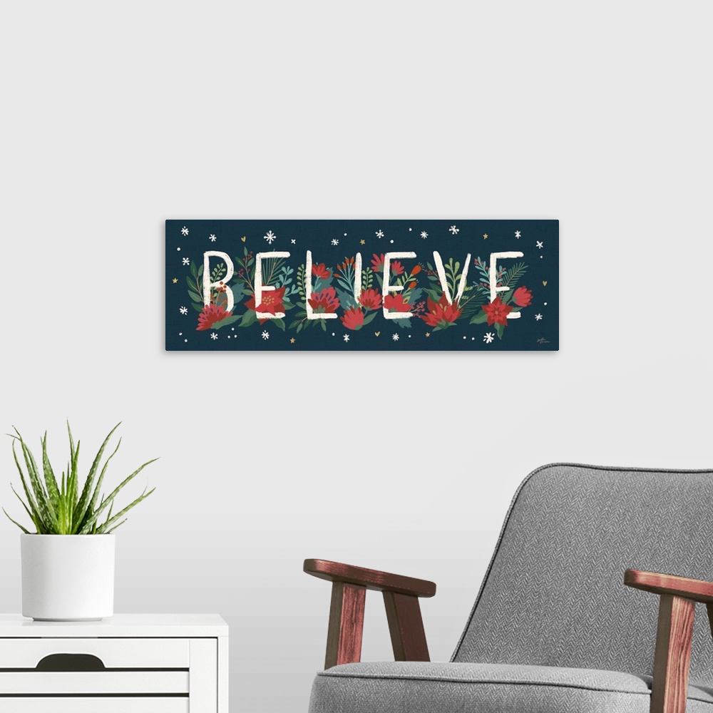A modern room featuring Decorative artwork of red flowers and leaves with the text "Believe" on a dark navy background.
