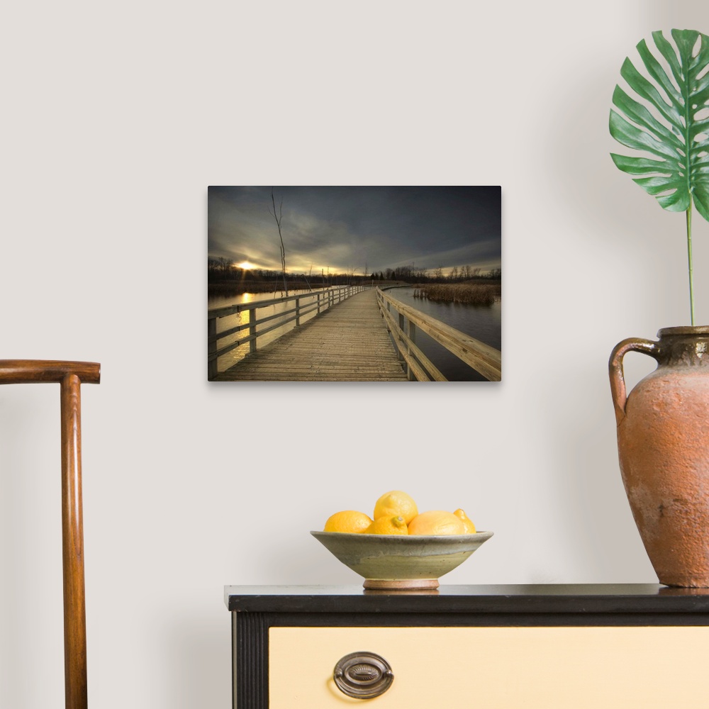 A wooden jetty across a lake at sunset Wall Art, Canvas Prints, Framed ...