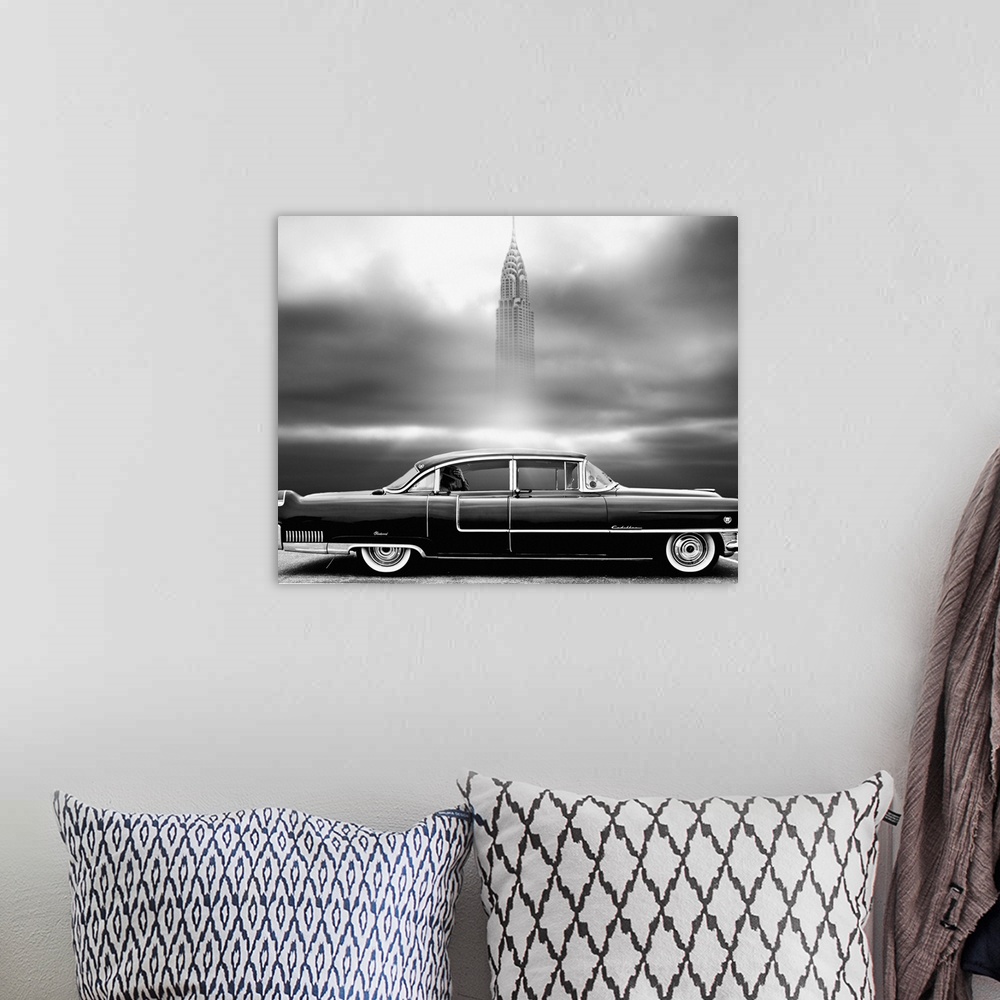 A bohemian room featuring Square black and white photograph of a parked vintage Chrysler with a man in the backseat and the...