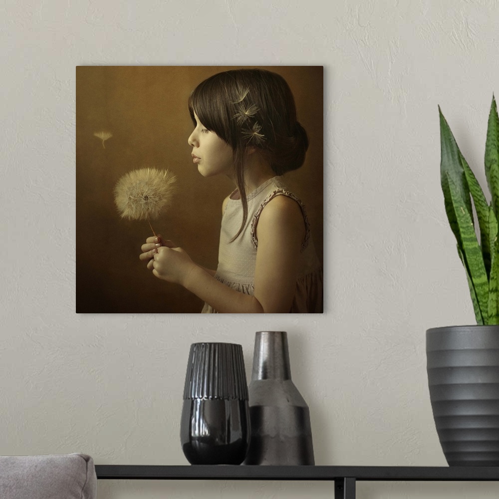 A modern room featuring A little girl holding a giant dandelion full of seeds, about to blow the wisps away.