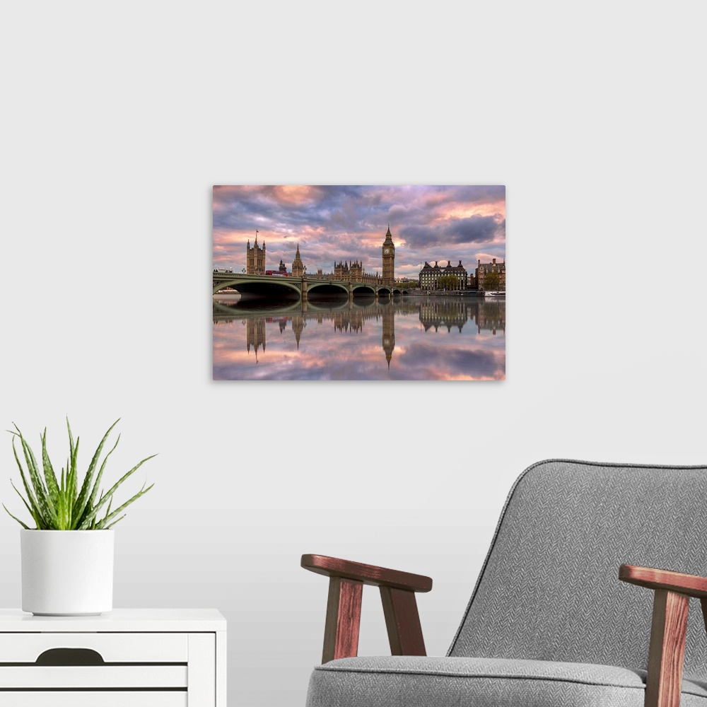 A modern room featuring Sunset photograph of the Westminster Bridge with Big Ben and the House of Parliament in the backg...
