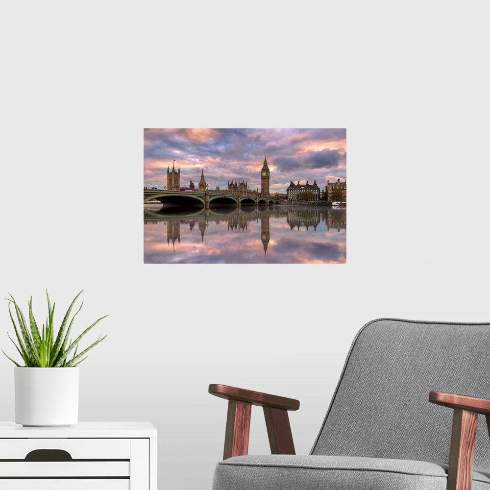 A modern room featuring Sunset photograph of the Westminster Bridge with Big Ben and the House of Parliament in the backg...