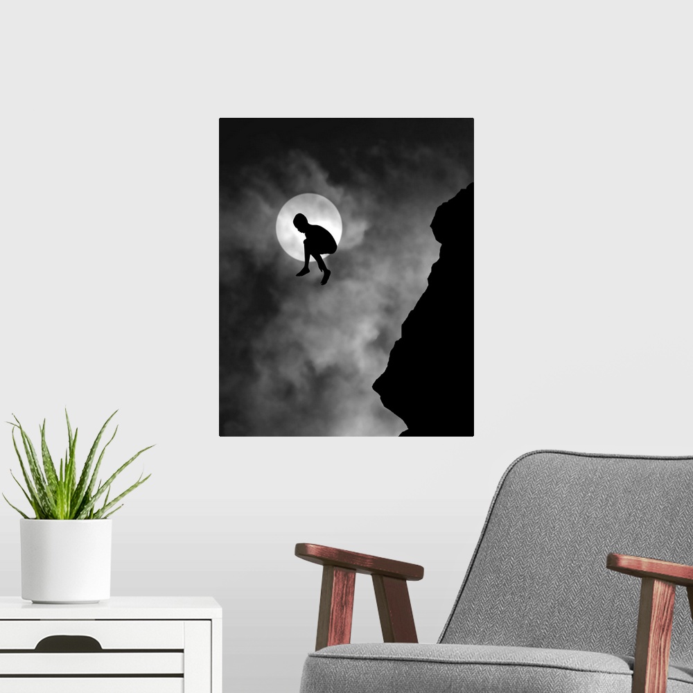 A modern room featuring Silhouette of a person jumping off a cliff, with the moon directly behind.