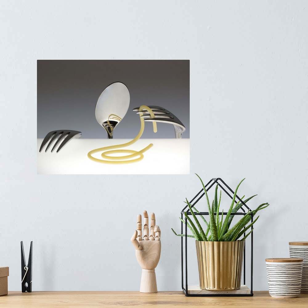 A bohemian room featuring Conceptual image of a spoon and two forks resembling a person, playing with spaghetti.