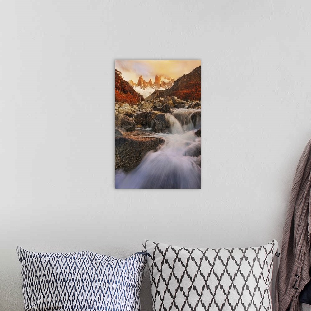 A bohemian room featuring Rushing waterfalls down the rocky landscape of Mount Fitzroy, Patagonia.