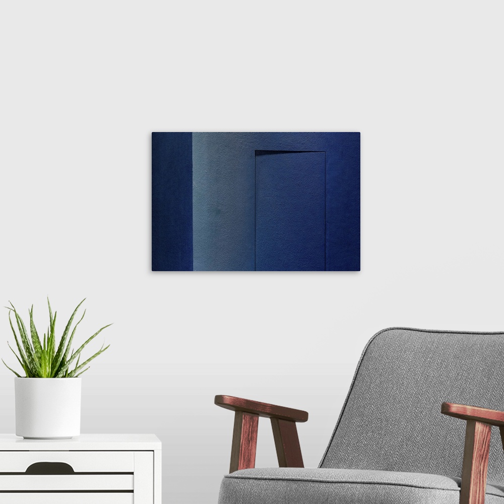A modern room featuring Blue Minimalism Or A Secret Door