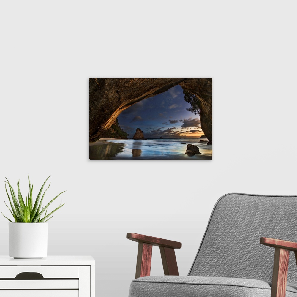 A modern room featuring Seascape from a beachside cave at twilight, Hahei Coast, New Zealand.