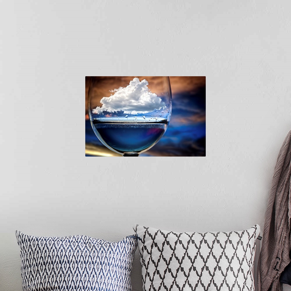 A bohemian room featuring A conceptual photograph of a white fluffy cloud sitting suspended in a drinking glass, against a ...