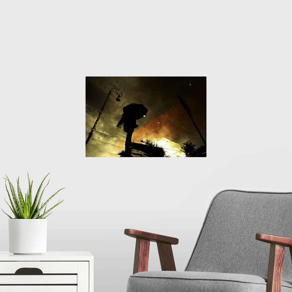 A modern room featuring Photo of the reflection of a figure with an umbrella, streetlights, and colors of the sunset, vie...
