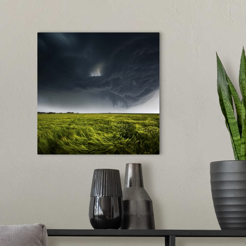 A modern room featuring Menacing dark clouds producing lightning over a green field in the countryside of Germany.