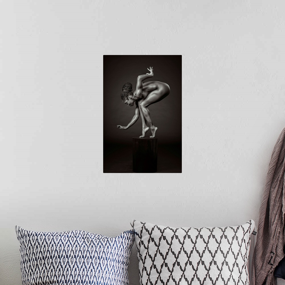 A bohemian room featuring Black and white fine art photograph of an African American woman balancing and posing on a pedest...